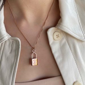 Louis Vuitton rose gold lock necklace